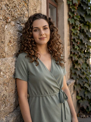 Olha, 29, Ukrainian woman from Lviv with curly chestnut hair seeking an American man for dating and marriage